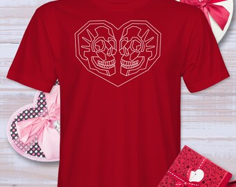 Puede incluir: Camiseta roja con un contorno blanco de dos calaveras formando un corazón.