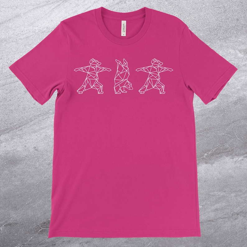 May include: A pink t-shirt with a white geometric design of three bears doing yoga poses.