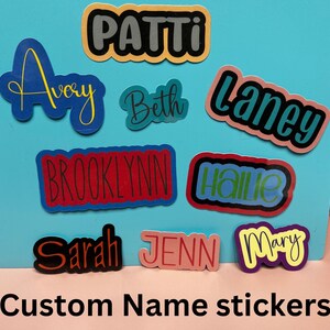 Custom name Stickers.  You pick Color and Font.