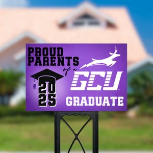 May include: Purple and white yard sign with the text "Proud Parents of a GCU Graduate 2025" and a white silhouette of a running antelope.
