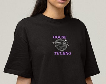 May include: Black t-shirt with a graphic of a stylized globe with the text "HOUSE TECHNO" in purple.