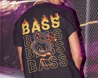 May include: Black t-shirt with the word "BASS" in yellow outlined letters with flames above each letter. A detailed illustration of a snake is below the word "BASS". The shirt is short-sleeved.
