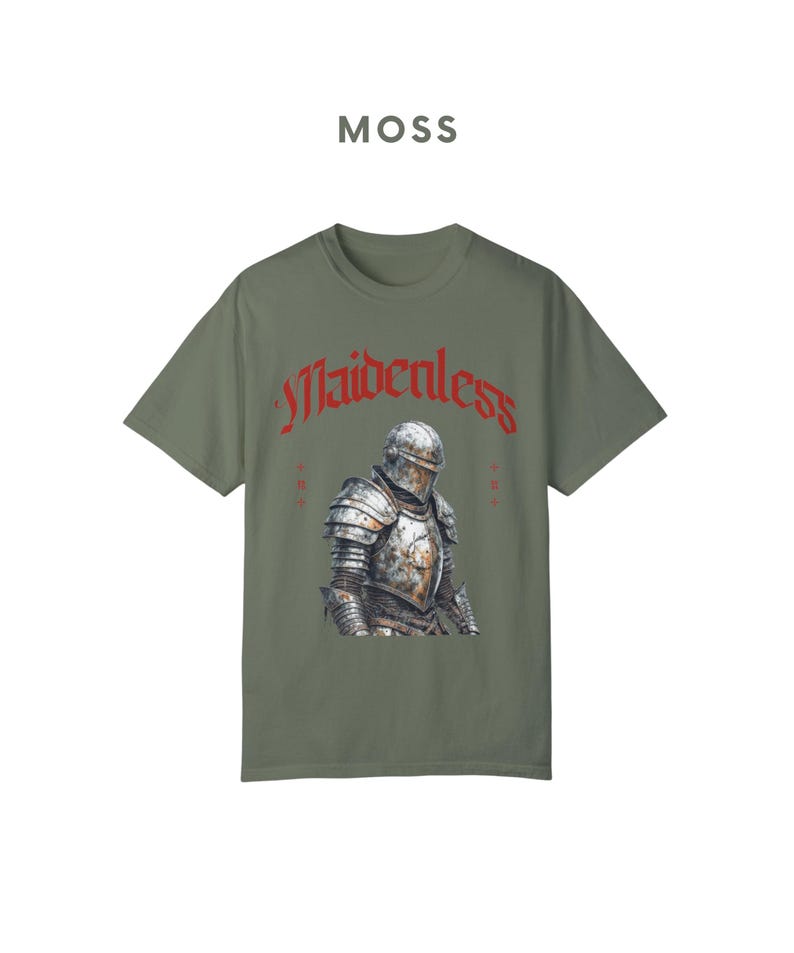May include: A green t-shirt with a graphic of a knight in armor and the text "Maidenless" in red.
