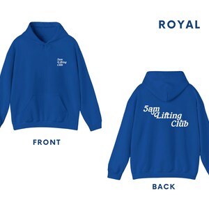 May include: Royal blue hoodie with a white "5am Lifting Club" logo on the front and back. The logo is in a stylised font.