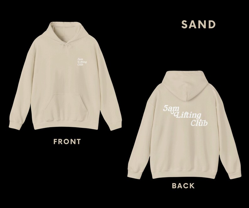 May include: A sand-coloured hoodie with the text "5am Lifting Club" in white on the back and a smaller version of the text on the front.