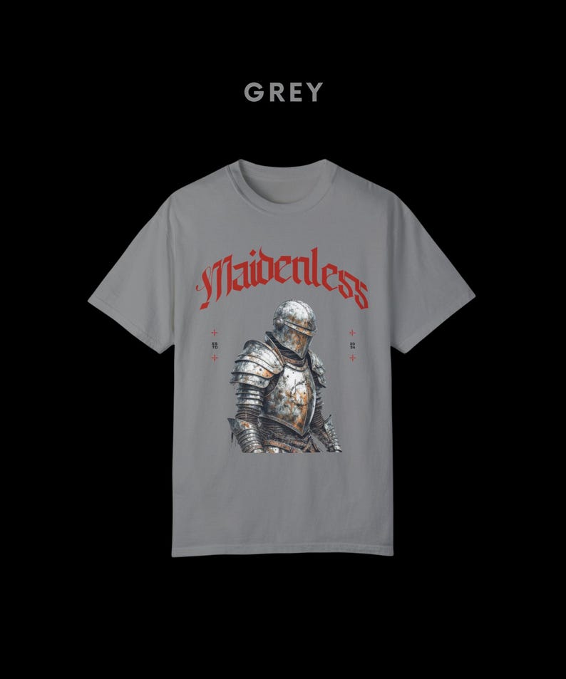 May include: Grey t-shirt with a knight in armor graphic and the text "Maidenless" in red.
