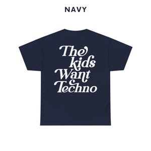 May include: A navy blue t-shirt with white text that reads "The Kids Want Techno".