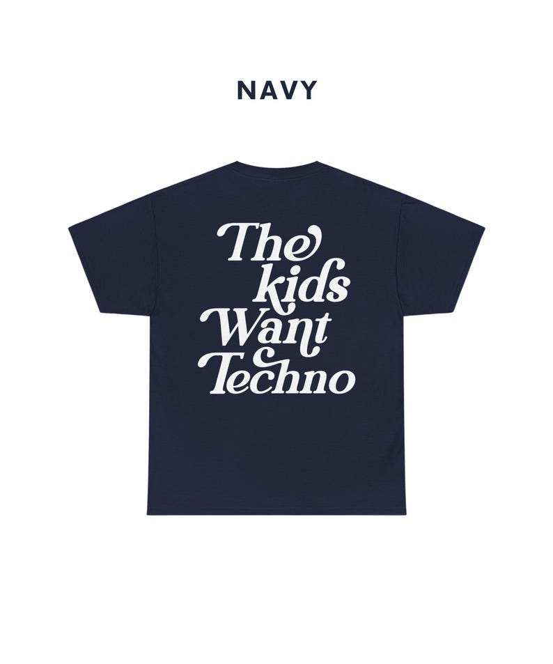 May include: A navy blue t-shirt with white text that reads "The Kids Want Techno".