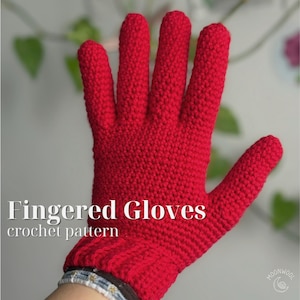 May include: A bright red crocheted glove featuring a textured stitch pattern and a ribbed cuff. The image includes the white text Fingered Gloves crochet pattern and a small circular logo in the corner with the word Moonwool.