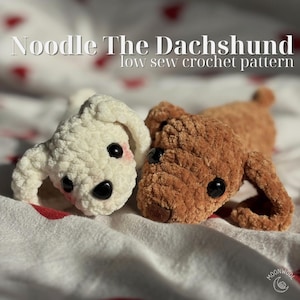 May include: Two plush crochet dachshund toys, one cream and one brown, featuring black safety eyes and floppy ears. The text Noodle The Dachshund low sew crochet pattern is displayed at the top, with a small logo in the bottom right corner.