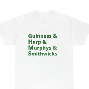 May include: White t-shirt with green text that reads "Guinness & Harp & Murphys & Smithwicks"