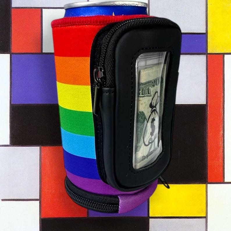 May include: A rainbow-colored neoprene can cooler with a black zippered pouch and a clear window for cash. The pouch has a zipper on the side and a zipper on the top.