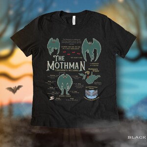 May include: Black t-shirt with a graphic of the Mothman, a cryptid from West Virginia folklore. The graphic includes a detailed illustration of the creature, its physical characteristics, and its origins. The text reads "The Mothman, Strigomantis Nocturnus, The Silent Flyer, A Harbinger of Disaster, Mothman's Origins".