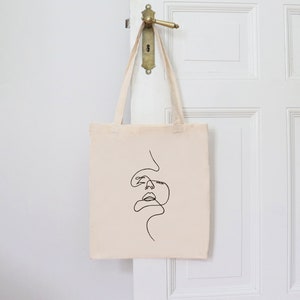Handbemalte One Line Gesicht Tragetasche | Einzigartiger Stoffbeutel aus 100% Baumwolle | Nachhaltiges Geschenk für Kunstliebhaber
