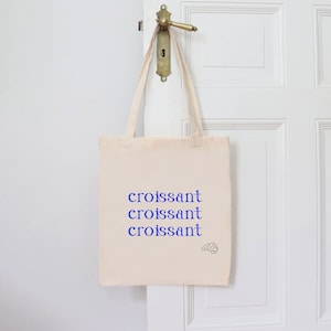 Croissant Tragetasche Frankreich | Stoffbeutel mit langen Henkeln | Baumwolle Jutebeutel Einkaufstasche | Blauer Croissant Schriftzug