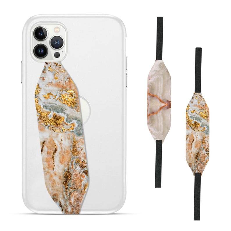 Switchbands reversible phone grip strap – Wood Resin Pearl design. Features a sophisticated 3D pattern combining natural wood textures with elegant resin and pearl accents. Provides a secure, comfortable grip while adding a refined, nature-inspired touch to your phone. The reversible design offers versatility, perfect for those who love chic, earthy aesthetics with a hint of luxury.