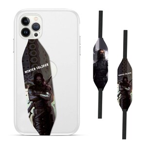 May include: A white iPhone case with a clear back and a black and white image of a superhero with the text "Winter Soldier" on the front. The case also has a black strap with a similar image and text.