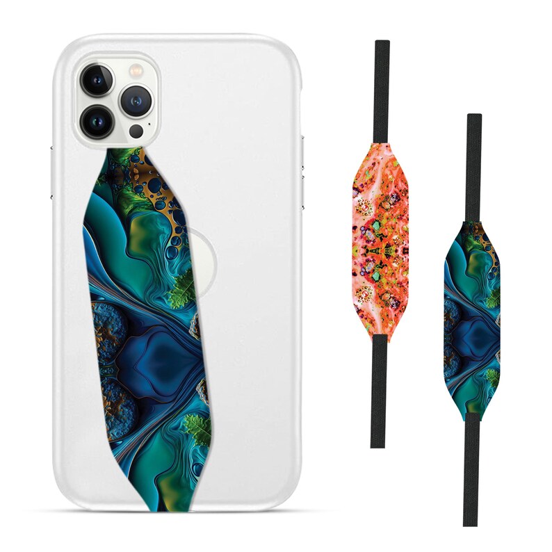 Switchbands reversible phone grip strap – Palm Glow Resin design. Features a stunning 3D pattern with soft, glowing palm leaf details embedded in resin. The design exudes tropical vibes with a touch of elegance. Provides a secure, comfortable grip while adding a serene, nature-inspired touch to your phone. The reversible design offers versatility, perfect for those who love fresh, vibrant, and chic accessories with a tropical flair