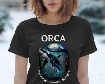 Maglietta con grafica stravagante di orca e balena, maglietta con design vivace dell'oceano, maglietta con illustrazione della natura, regalo per gli amanti delle balene, abbigliamento unico per la vita marina