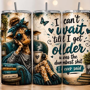 May include: A cylindrical tumbler with a straw featuring a giraffe illustration wearing sunglasses and a headband, sitting in a chair with books. The text reads: I can't wait till I get older u was the dumbest shit I ever said. The books are labeled.