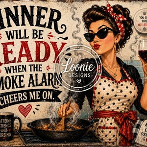 May include: A decorative metal sign featuring a retro-style illustration of a person cooking with the text: DINNER WILL BE READY WHEN THE SMOKE ALARM CHEERS ME ON. Includes kitchen items like a wine glass, a frying pan, and various mugs with text.