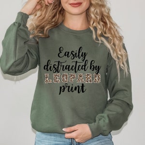 Easily distracted by leopard print sweatshirt Leopard lover Cheetah design Funny sweatshirt Sarcastic sweater Trendy Leopard Women Shirt