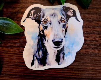 May include: A watercolor painting of a black and tan dog with brown eyes. The dog is looking directly at the viewer. The background is a soft blue and white watercolor wash.