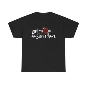 May include: Black t-shirt with the text "Left my heart in the Sierra Madre" in white script. A red heart graphic is incorporated into the design. The shirt is a casual wear item.