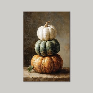 May include: A still life painting of three pumpkins stacked on top of each other. The top pumpkin is white, the middle one is green, and the bottom one is orange. A small green leaf rests on the surface in front of the pumpkins.