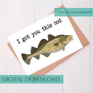 May include: A greeting card with a cartoon illustration of a codfish. The text "I got you this cod" is printed above the fish. The card is on a brown envelope, with the words "DIGITAL DOWNLOAD" and "Free envelope templates" printed on the card.