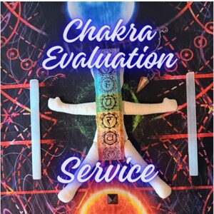 May include: A white fabric doll with seven colorful chakras displayed on its torso. The doll is lying on a black and red patterned surface with two white crystal wands on either side. The text "Chakra Evaluation Service" is written in purple above the doll.