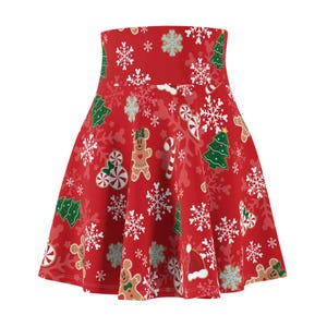 May include: Red skater skirt with a Christmas print featuring gingerbread men, candy canes, snowflakes, and Christmas trees.
