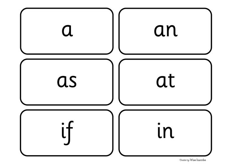 May include: Black and white flashcards with the words "a", "an", "as", "at", "if", and "in" printed on them.