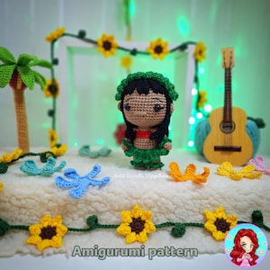 May include: Amigurumi pattern for a crocheted doll wearing a green lei and a brown top. The doll is surrounded by crocheted flowers and leaves. The text "Amigurumi pattern" is written below the doll.