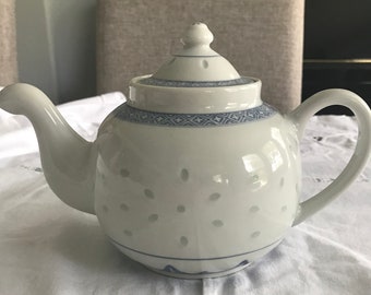 Vintage ceramic Chinese blue and white rice patterned teapot