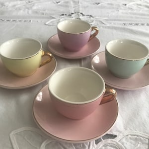 Vintage pastel colored demi tasse coffee cups and saucers