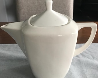 Vintage white ceramic teapot