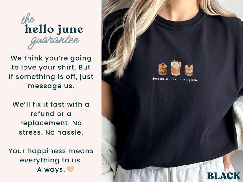 Może przedstawiać: Czarny t-shirt z małą grafiką trzech koktajli i napisem "just an old fashioned girlie". Koszulka ma r&oacute;wnież napis "the hello june guarantee" i słowo "BLACK" na dole.