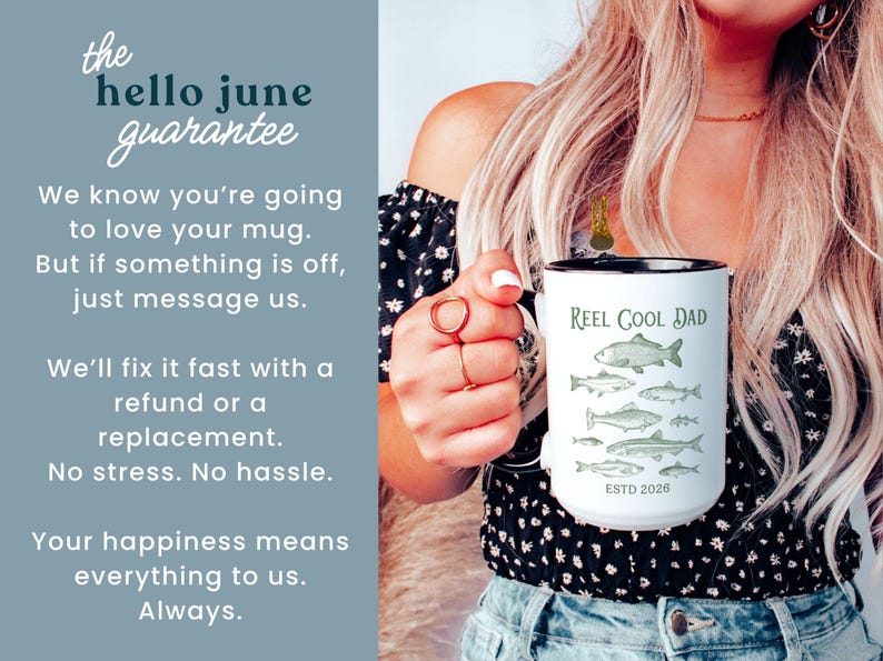 May include: White ceramic mug with a black rim featuring the text "REEL COOL DAD" and illustrations of fish. The mug also has the text "ESTD 2028". The image includes text that says "the hello june guarantee".