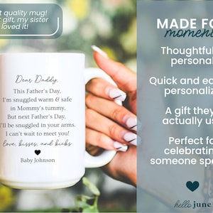 May include: White ceramic mug with a handle, featuring a heartfelt message to "Daddy" for Father's Day, including a baby's message of love. The mug has a black heart and the name "Baby Johnson". The mug is held by a person.