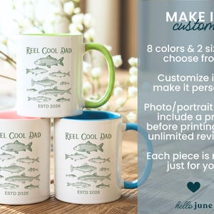 May include: White ceramic mugs with colourful handles and interiors, featuring a fish illustration and the text "REEL COOL DAD ESTD 2026". The mugs are available in various colours and sizes, ideal for a fishing enthusiast.