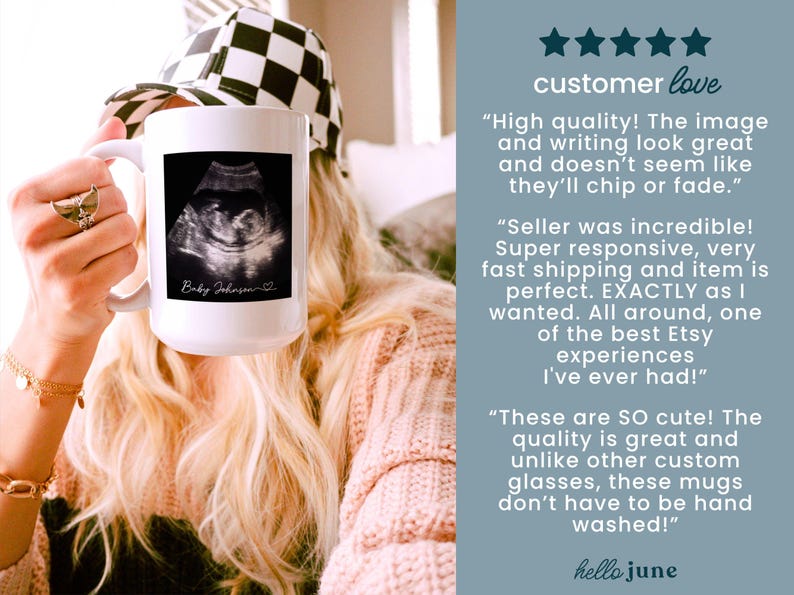 May include: White ceramic mug featuring a black and white ultrasound image. The mug has the text "Baby Johnson" in a script font. The mug is held up by a person.