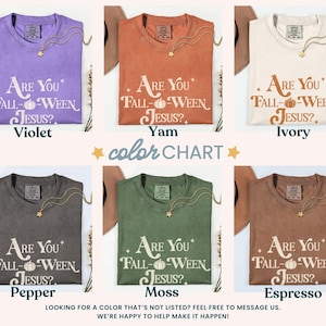 May include: A color chart of six t-shirts in various colors: violet, yam, ivory, pepper, moss, and espresso. Each shirt features the text "Are You Fall-Ween Jesus?" in a stylized font. A gold necklace with a star pendant is draped on each shirt.