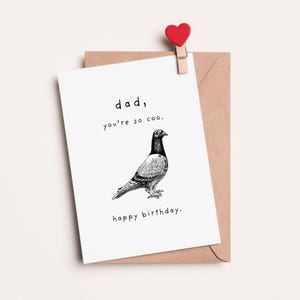 May include: A white card with black text that reads "dad, you're so coo. happy birthday." and a black and white illustration of a pigeon.