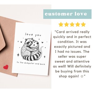 May include: A black and white illustration of a raccoon and opossum hugging. The card reads "love you to the dumpster and back".