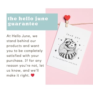May include: A white card with a black and white illustration of two raccoons hugging. The text "love you" is above the raccoons and the text "to the dumpster and back" is below the raccoons.
