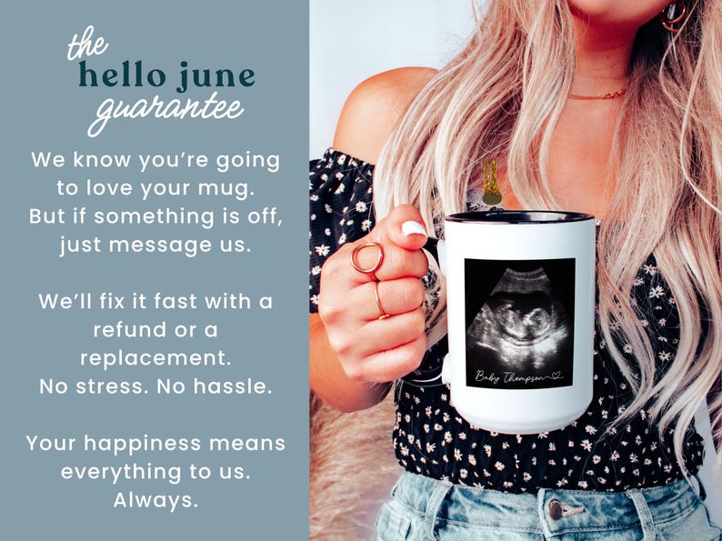 May include: White ceramic mug with a black rim, featuring a black and white ultrasound image and the text "Baby Thompson". The mug is held by a person. The mug is part of the "hello june guarantee".