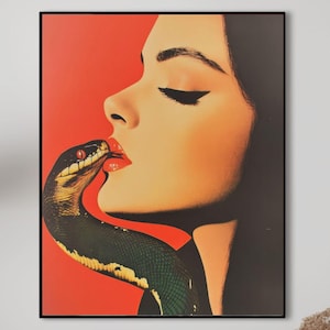 May include: A woman with long dark hair is depicted in a vintage style illustration. Her lips are parted and a green snake with a red eye is wrapped around her neck. The background is a solid red color.