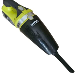 May include: A handheld Ryobi vacuum cleaner featuring a bright lime green and black plastic body. The device includes a black tapered nozzle attachment, a top-mounted power switch, and the Ryobi brand name printed in white on the black dust canister.