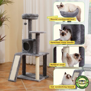 May include: A gray cat tree with a round cushioned bed, a cozy condo, a scratching post, and a scratching board. The cat tree is made of sisal and plush fabric. A cat is shown using the different features of the cat tree.